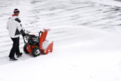 Man plowing snow